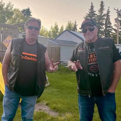 Regina HOG Chapter 9252 members with chapter banner