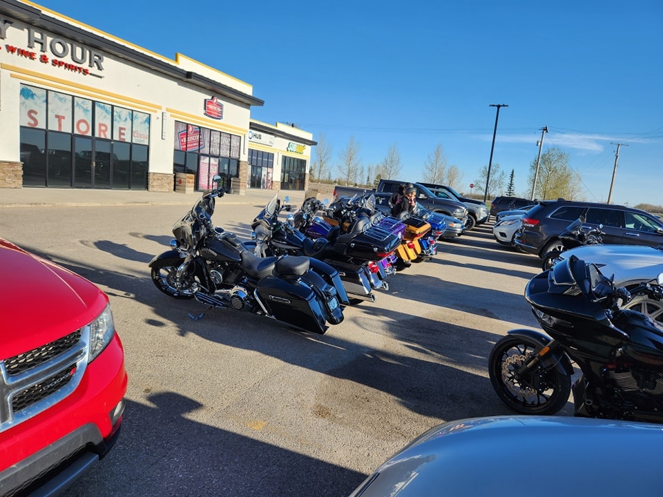 Regina HOG Chapter 9252 bikes parked at a ride stop