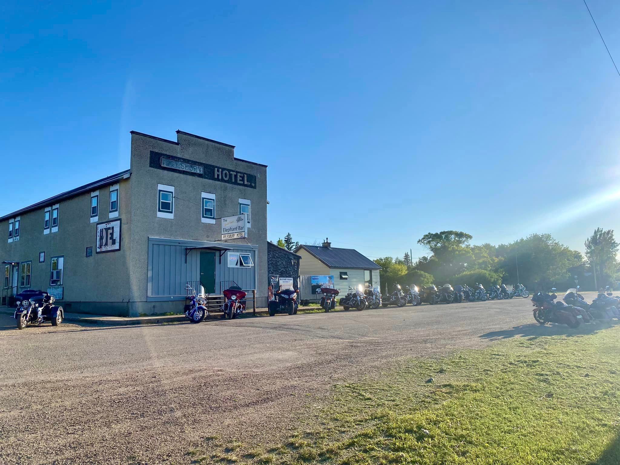 Motorcycles parked outside the historic Aylesbury Hotel on a chapter ride