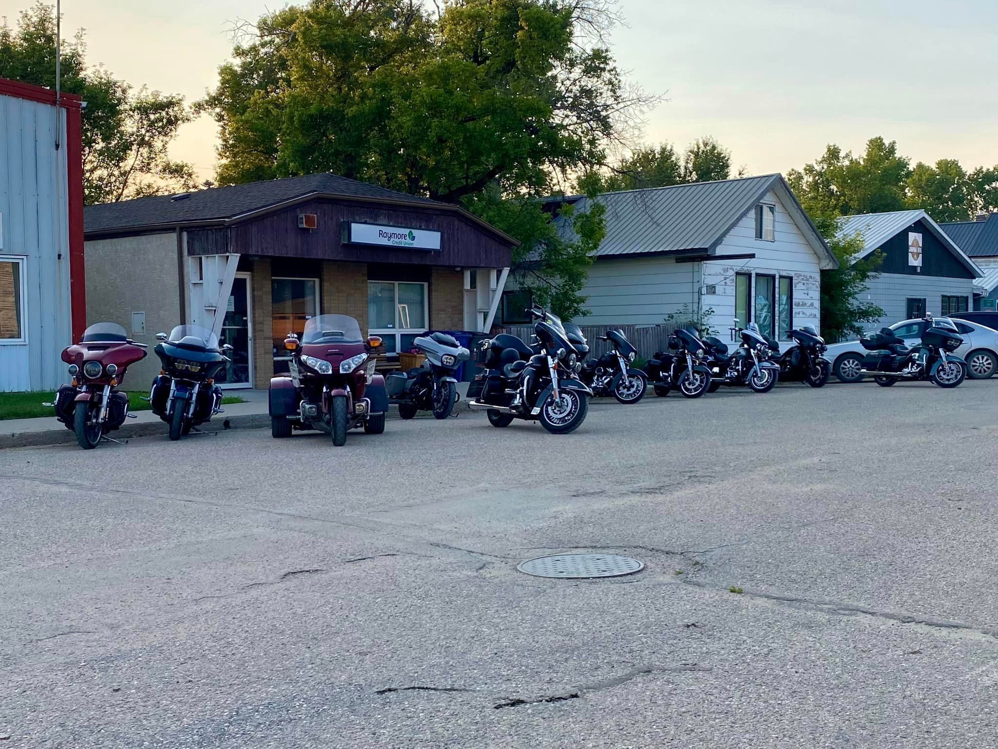 Bikes lined up outside the Raymore Credit Union on a chapter ride