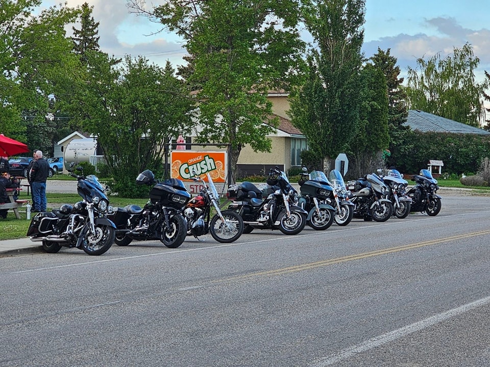 Regina HOG Chapter 9252 bikes lined up at a ride stop