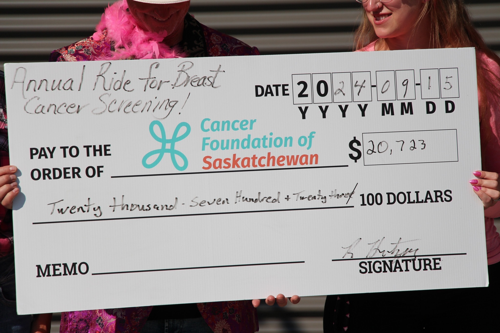 Close-up of the $20,723 ceremonial cheque for the Cancer Foundation of Saskatchewan from the 2024 Annual Ride for Breast Cancer Screening
